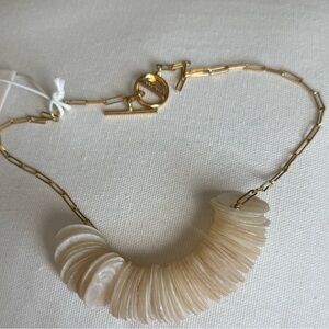 Serefina from Anthropologie Elegant Gold and Cream paperclip and shell Necklace